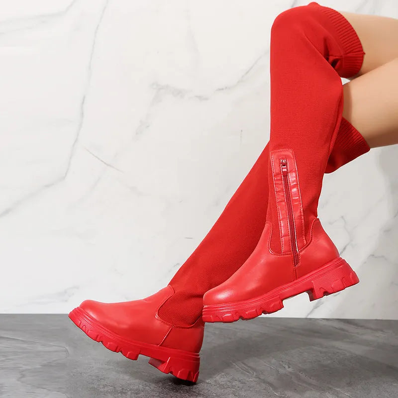 Women's knee high boots in black or red with side zipper, 3-5 cm square mid heel, artificial PU upper, and rubber sole.