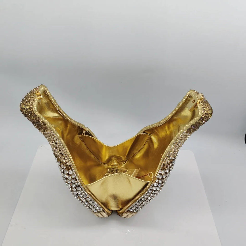 Gold rhinestone champagne bottle shaped hard case evening clutch bag on display