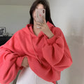 Women's loose hooded mulberry silk sweater in watermelon red colour with sleeveless design
