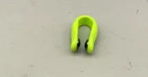 Tiger mouth massage clip multi-function acupoint massager in black on a hand, showing placement between thumb and index finger