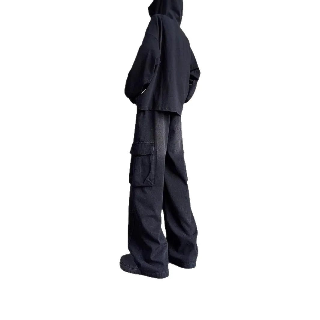Washed vintage denim men's casual wide-leg pants with drawstring waist and multiple pockets, blue colour, front view