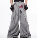 Boy modelling black wide-leg summer trousers with a relaxed fit and Korean-inspired style.