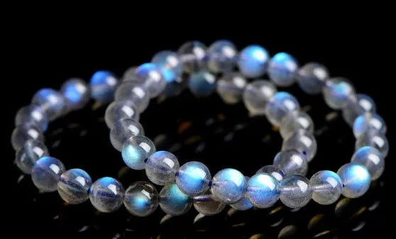 Natural cream body blue moonlight crystal bracelet showing various bead size options on a white background.