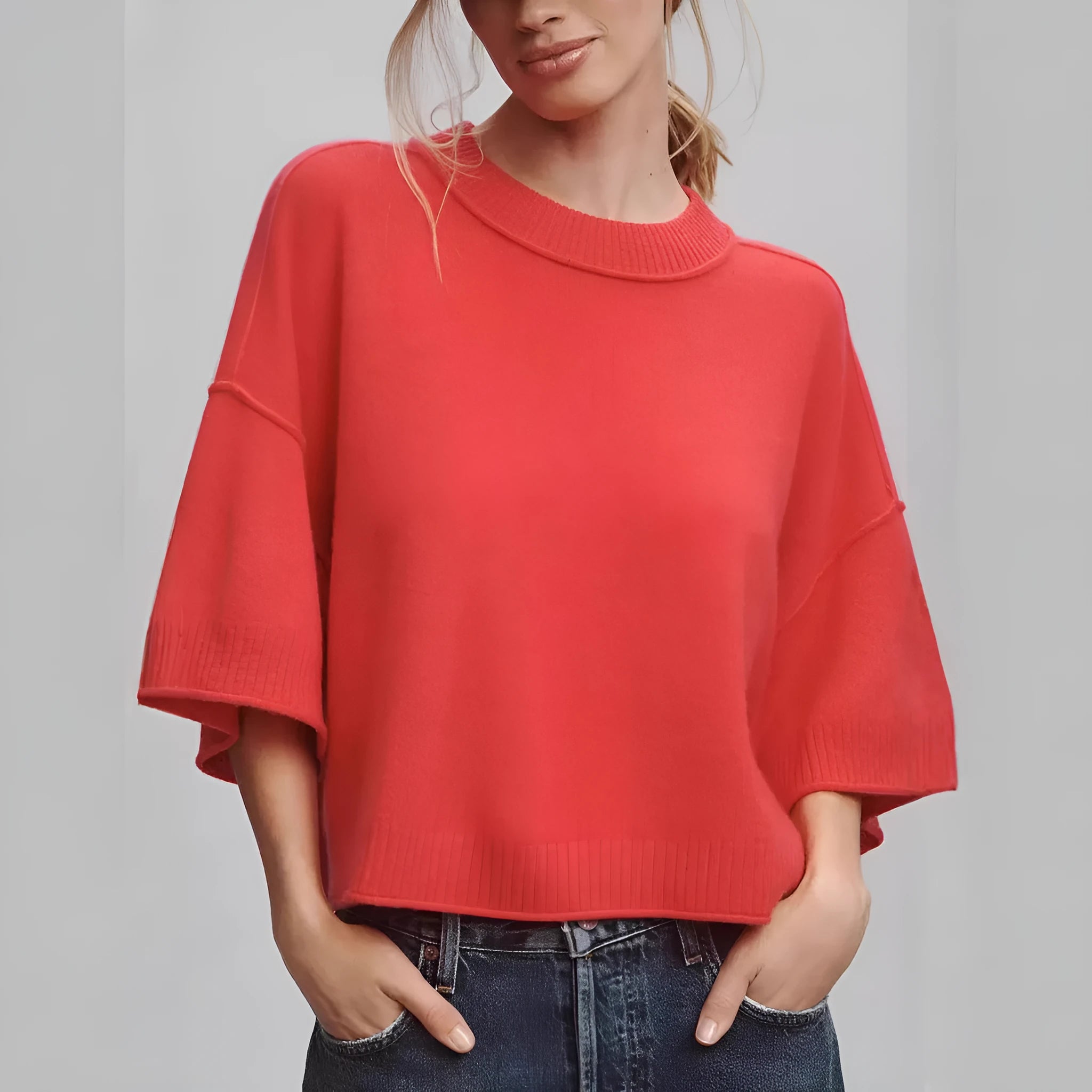 Red short sleeve viscose T-shirt with a cropped hem on a mannequin.