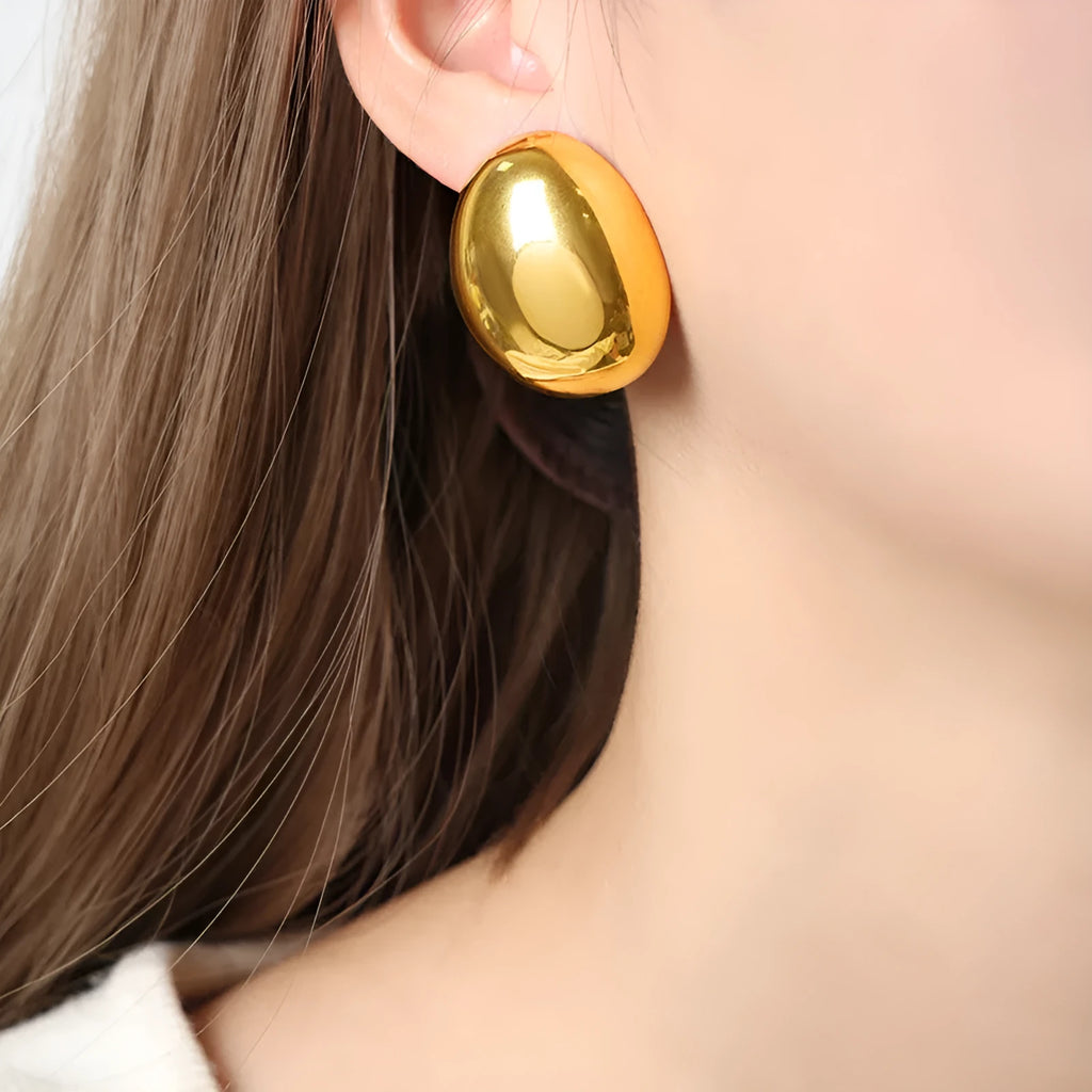 Geometric stainless steel ear studs with 18K gold electroplating and glazed surface in DFE139 colour