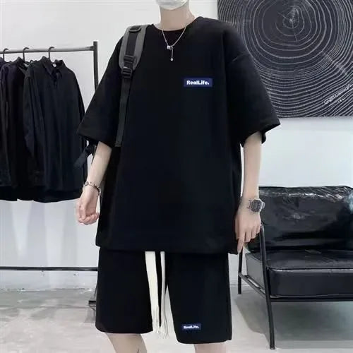 Waffle-textured leisure sports suit in cotton-polyester blend with short sleeves and shorts