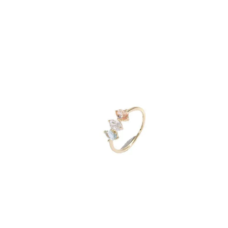 Geometric copper ring with a horse eye motif and tricolour zircon stone, electroplated in 14K Real Gold RG9066 colour.