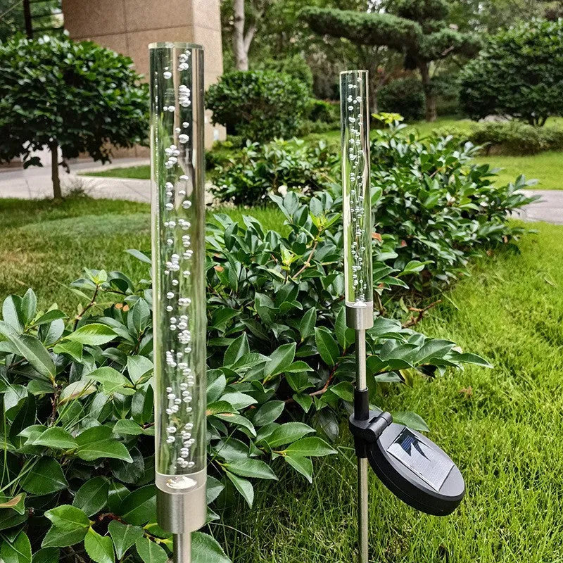 Solar bubble stick lawn lamp in stainless steel and acrylic with warm light and colorful slow flash effect