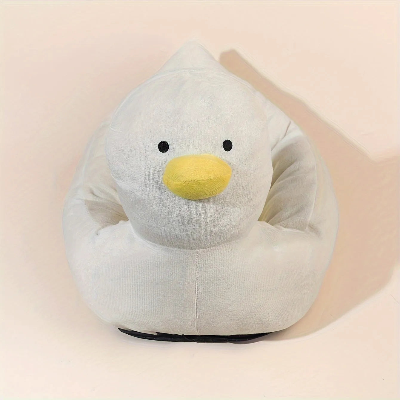 Blue duck-shaped soft polyester pet bed sofa for small dogs and cats on a wooden floor.