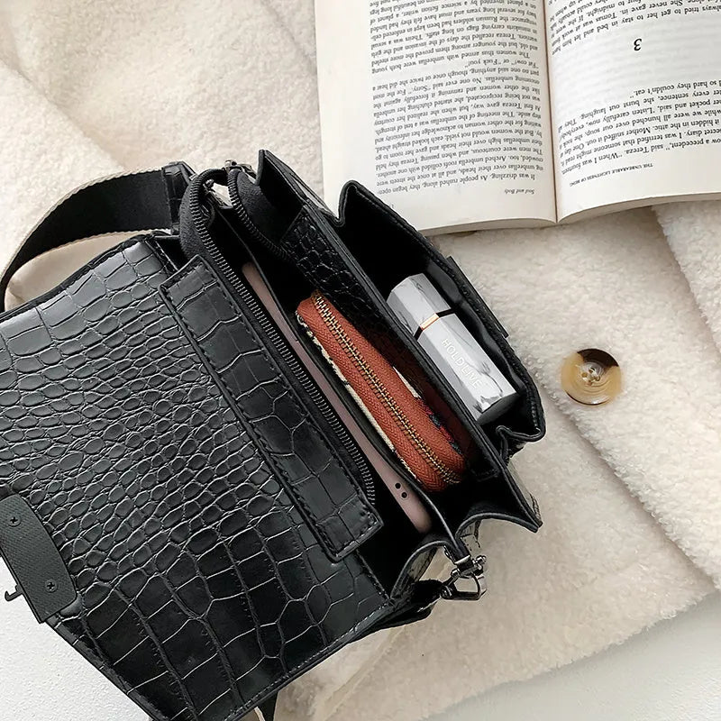 Vintage-style crossbody bag in PU material showing black, brown, khaki and red colour options