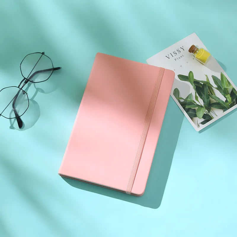 A5 tactile PU hardcover notebook with 96 sheets of 100gsm white paper and sewn adhesive binding, shown in available cover colours.