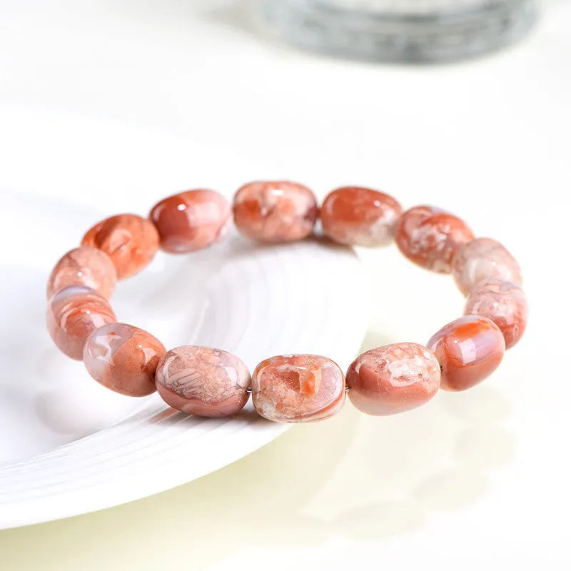 Natural cherry agate barrel bead bracelet with geometric 10x14mm beads and ruyi design