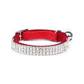 Red velvet cat collar with rhinestones, adjustable buckle, shown on a white background.