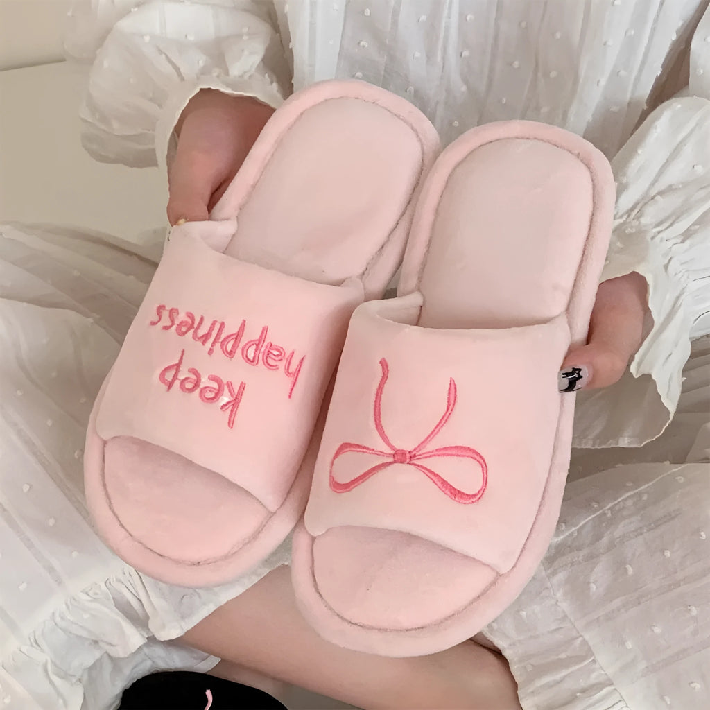 Ladies cotton slippers with letter pattern, bow, suede upper and flat non-slip PVC sole in beige yellow, pink or black