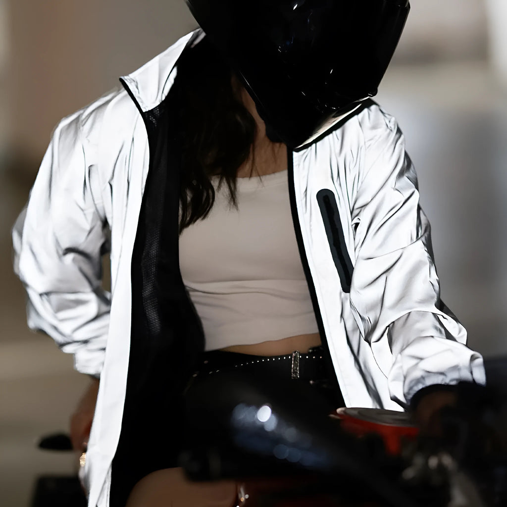 Waterproof polyester windproof long sleeve coat in silver, shown on a hanger.