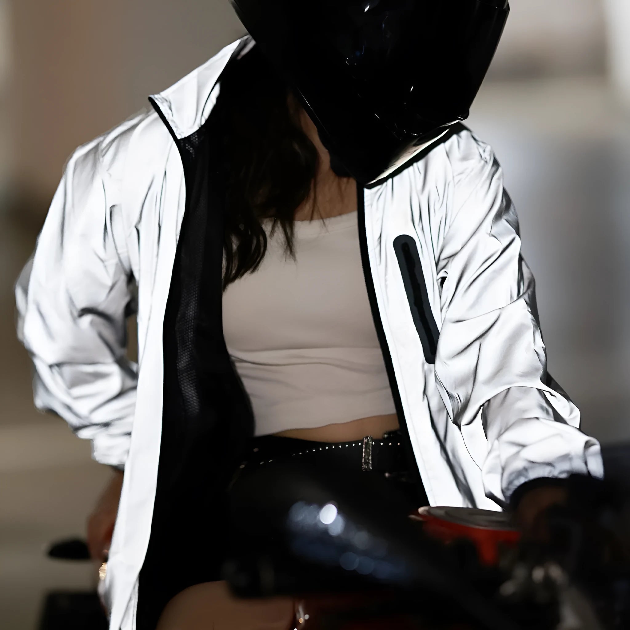 Waterproof polyester windproof long sleeve coat in silver, shown on a hanger.