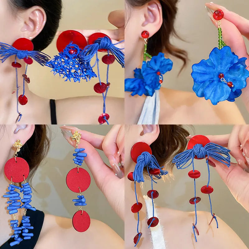 Women's geometric cloth earrings with blue resin flower detail and Silver Needle colour