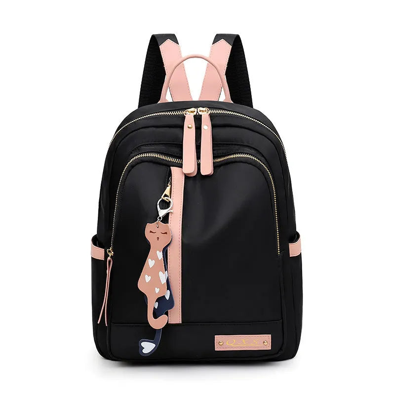 Women's black nylon casual backpack with double shoulder straps and front pocket