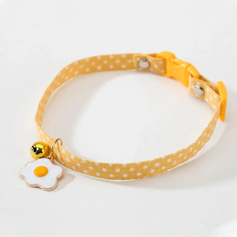 Adjustable pet collar with metal bell pendant and fabric bow tie decoration in choice of colours