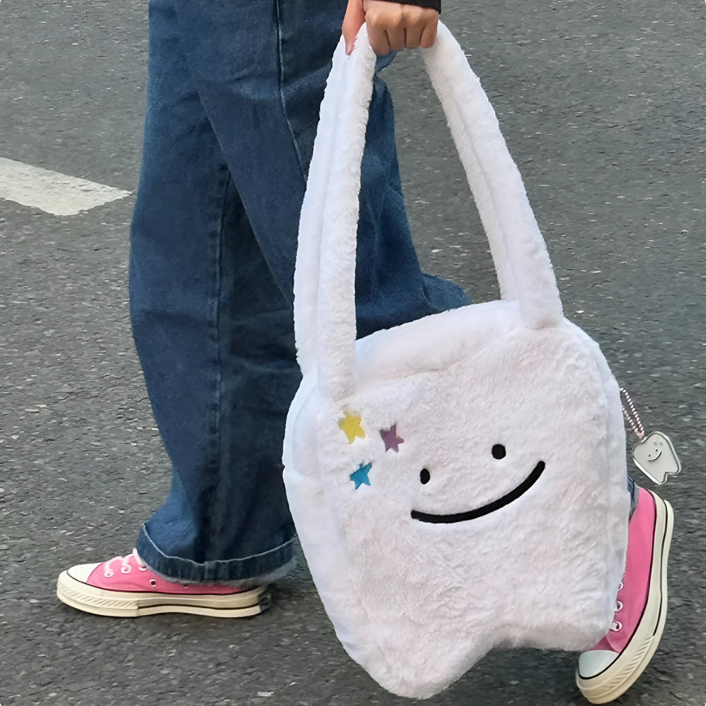 White plush large tooth shoulder tote bag with cute teeth design and crossbody strap