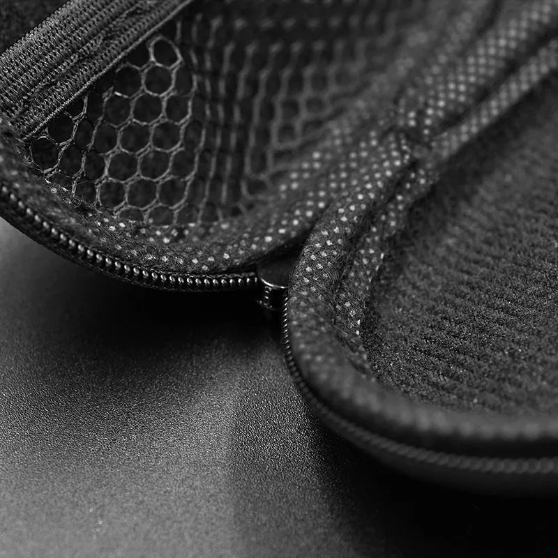 Black oval leather earphone storage bag compatible with EDX PRO and ZEX PRO earbuds.