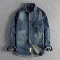 Men's washed vintage denim shirt in light blue and dark blue showing loose cardigan style and long sleeves