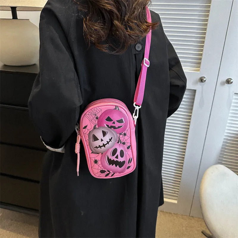 Halloween graffiti crossbody bag with pumpkin ghost bat print in medium 14x23x9.5cm size