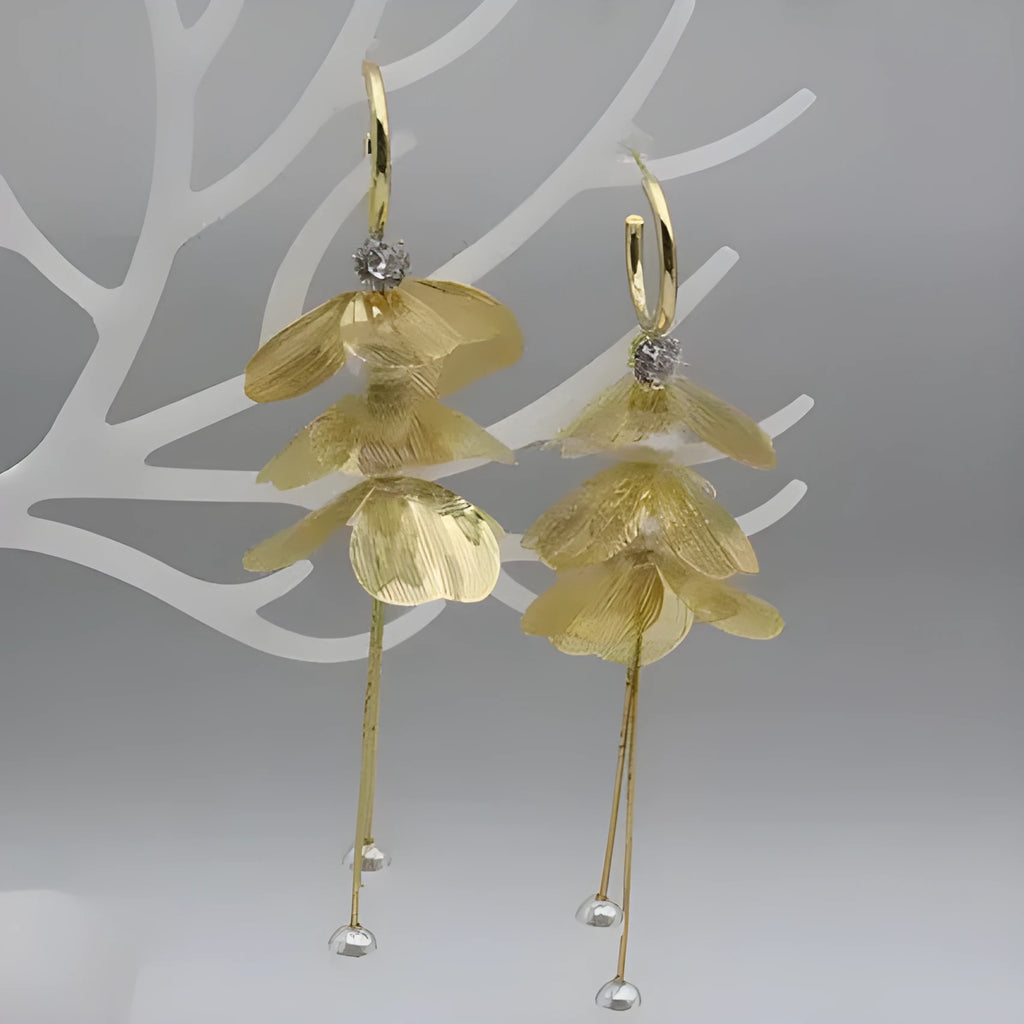 Floral petal pearl fringe earrings in gold with electroplated alloy and tassel drop design