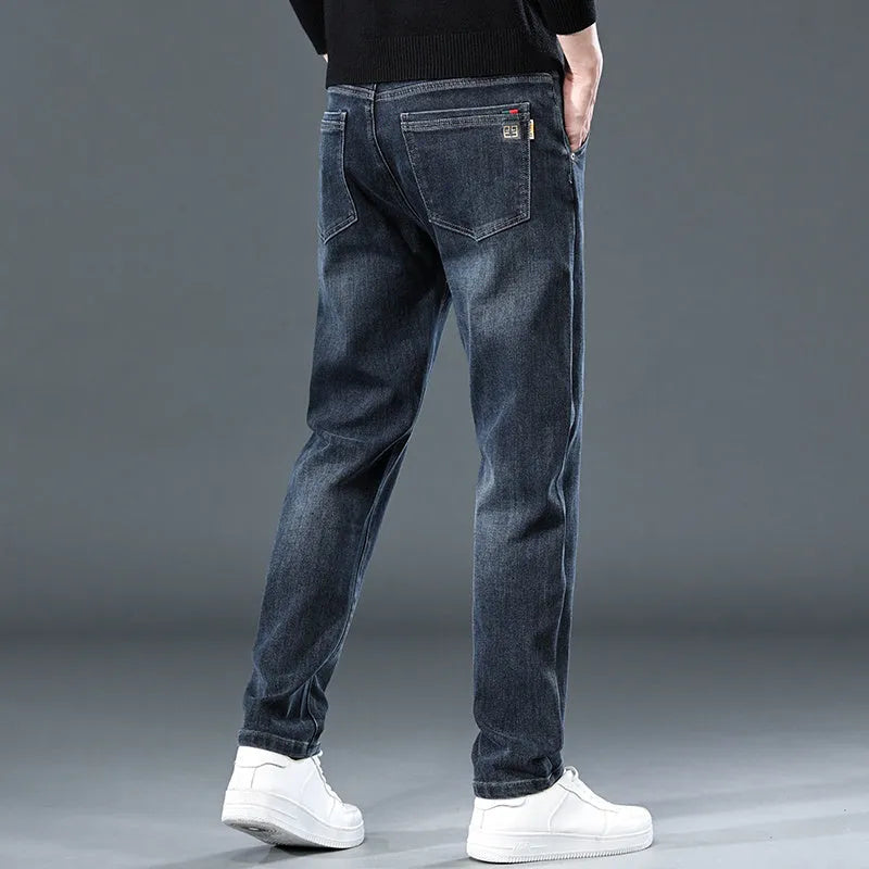 Men's slim straight casual trousers in thin polyester fabric available in black and blue grey colours