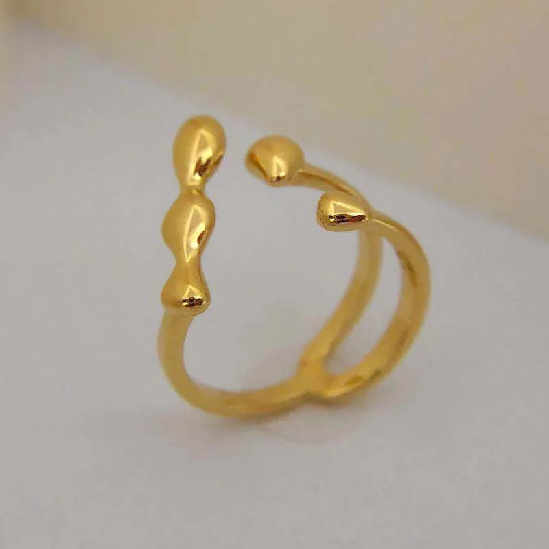 Brass spherical fashion ring in gold or silver colour for women