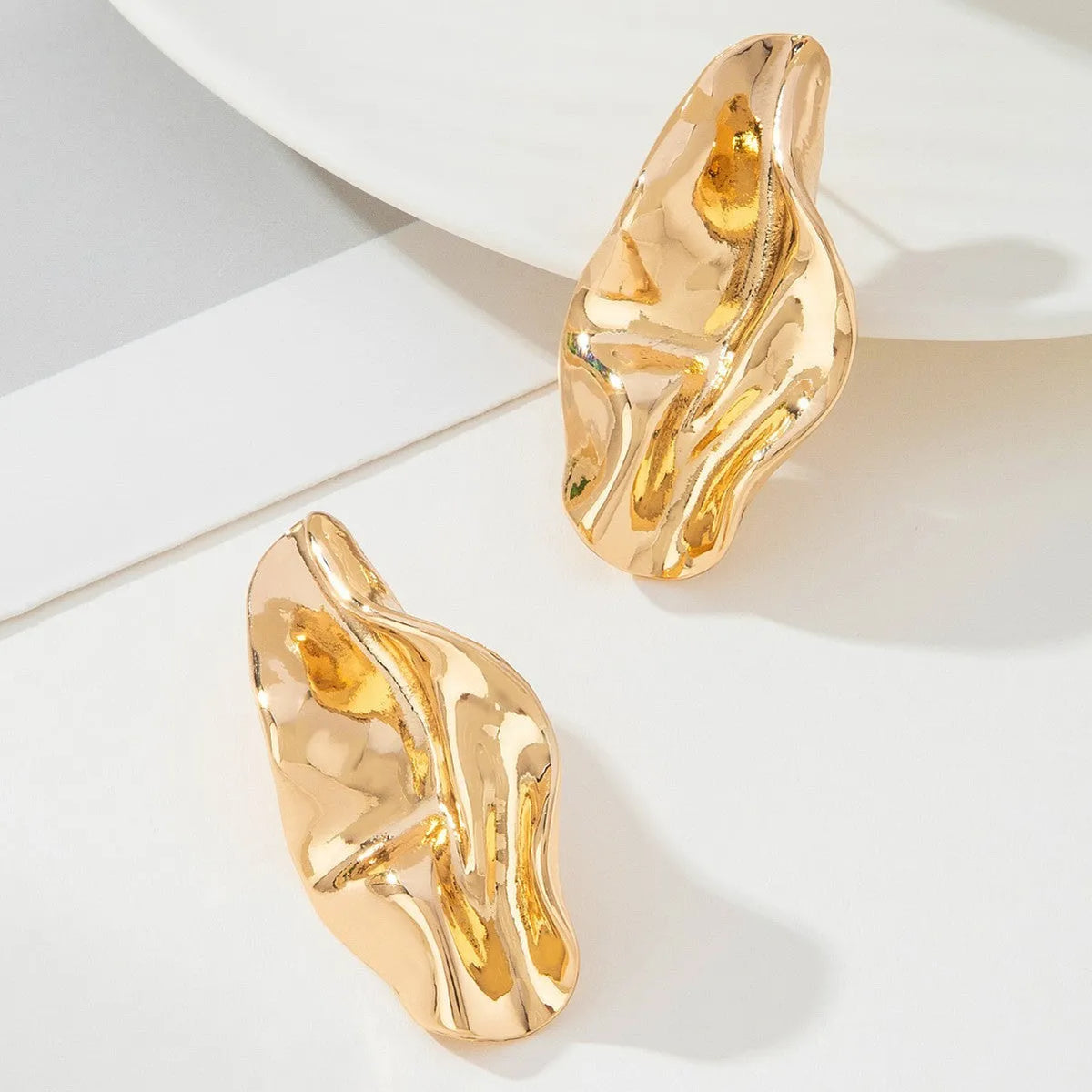 Gold irregular twisted stud earrings with diamond, drop, and geometric shapes, zinc alloy electroplated, one pair for women