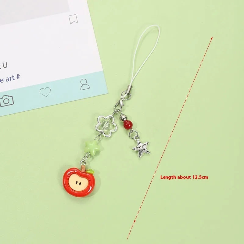 Fruit mobile phone charm keychain with apple, strawberry designs on plastic/resin with rope attachment