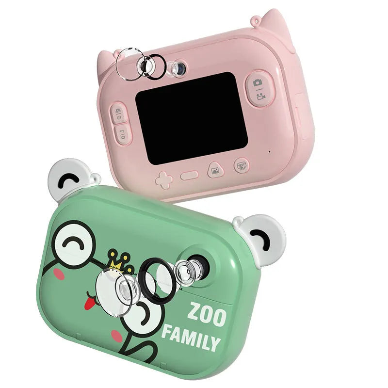 Blue, green, and pink coloured HD digital camera with 2.4-inch screen and accessories including printing paper.