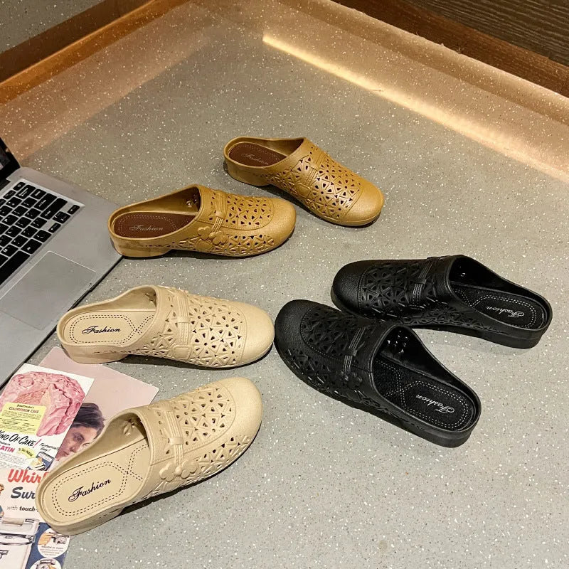 Women's apricot fairy style PVC half slippers with hollow-out design and flat toe box.