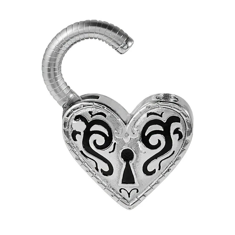 Close-up of a stainless steel heart-shaped earring with a gold-coloured electroplated finish.