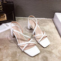 Women's thick-heeled sandals in apricot colour showing the high heel and open back sleeve design