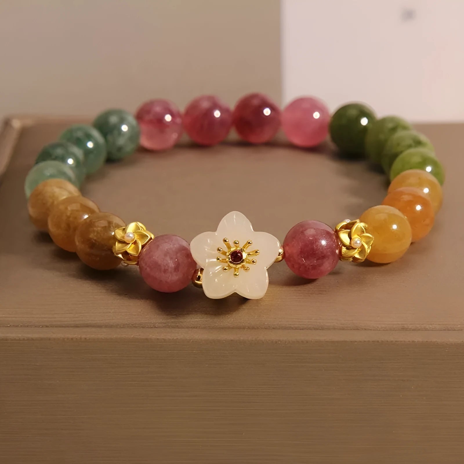 Natural tourmaline flower bracelet with geometric shapes and electroplated metal components