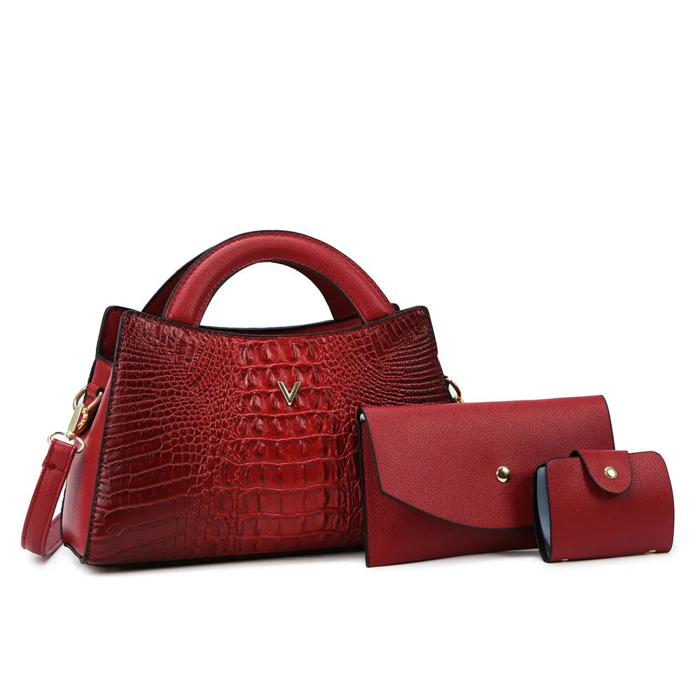 Women's black crocodile pattern PU leather crossbody handbag with square vertical shape and single strap.