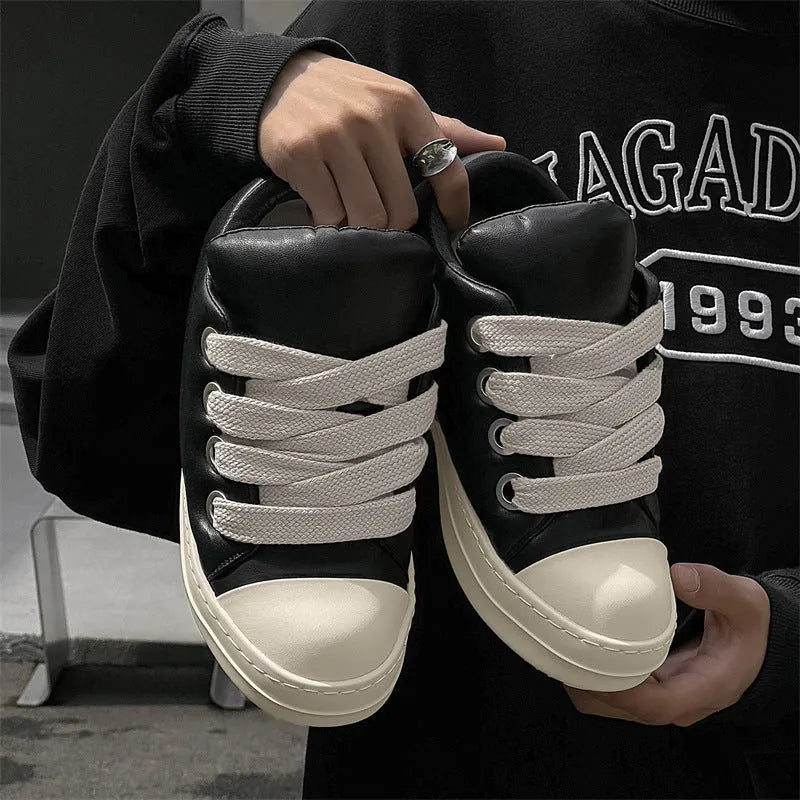 Men's black casual slip-on shoes with front lace-up and rubber sole