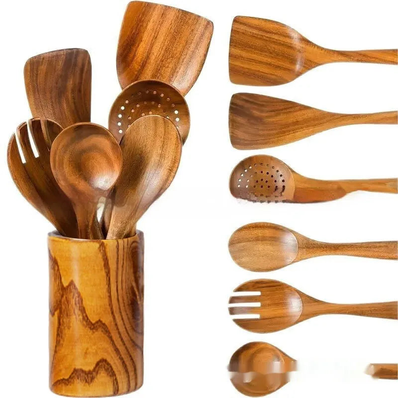 A set of seven wooden kitchen utensils including spoons and spatulas arranged together.