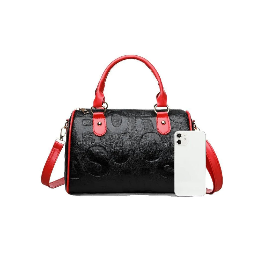 Cylindrical PU crossbody bag with three shoulder straps in red or brown colour with polyester lining