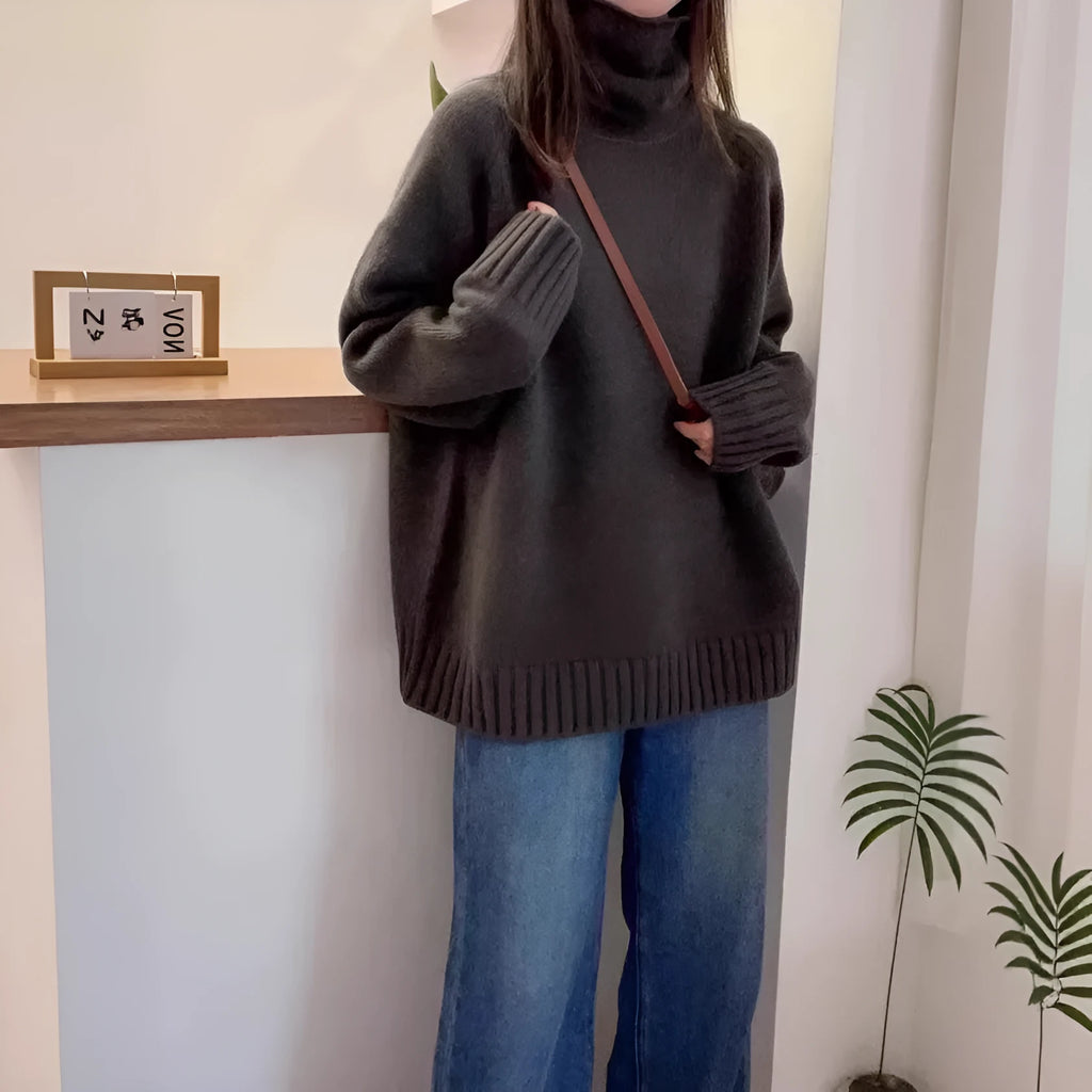 Women's loose fit turtleneck sweater with thick curling pile collar in camel colour