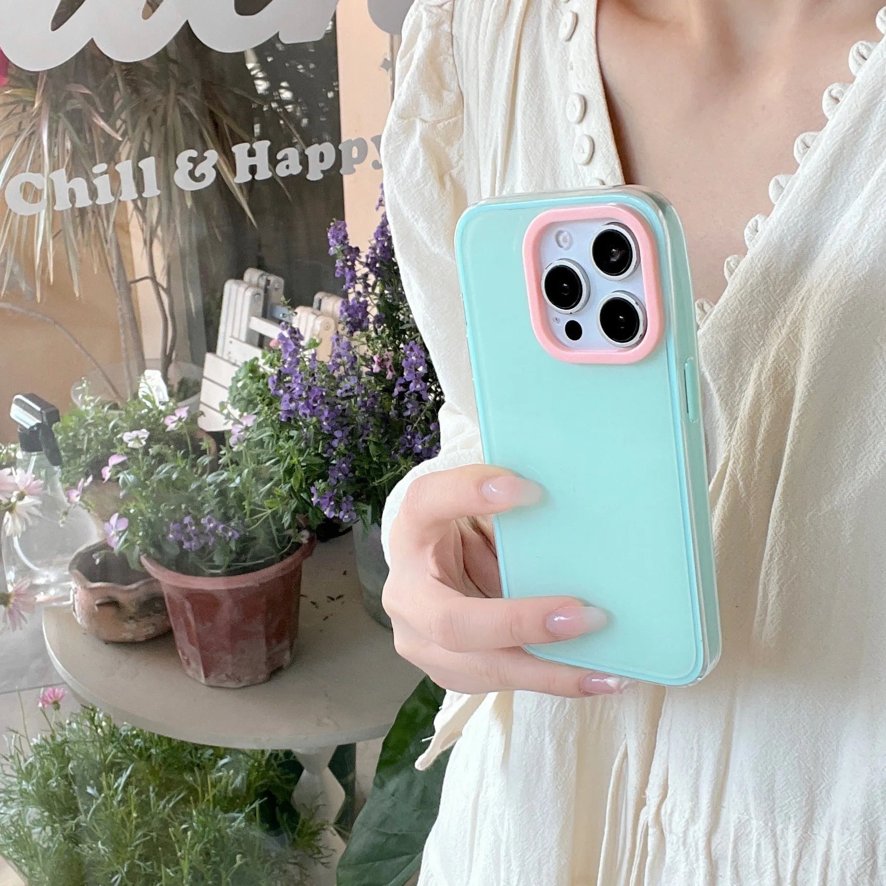 Simple solid colour jelly TPU phone case for iPhone, shown in blue, white and yellow.