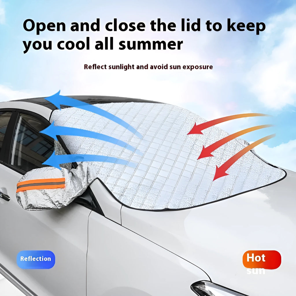 Large aluminium foil winter car cover for SUVs with reflective stripes and magnets on a vehicle windshield.