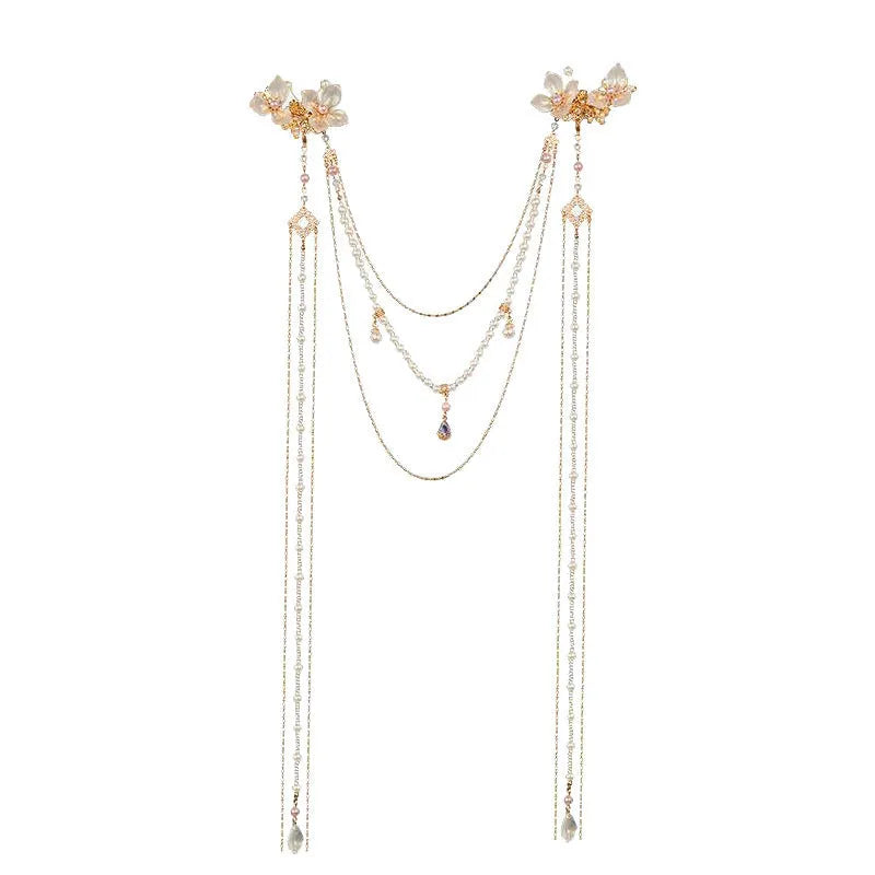 Gold acrylic women's hairpin with flower shape, pearl diamond details, and long tassel design