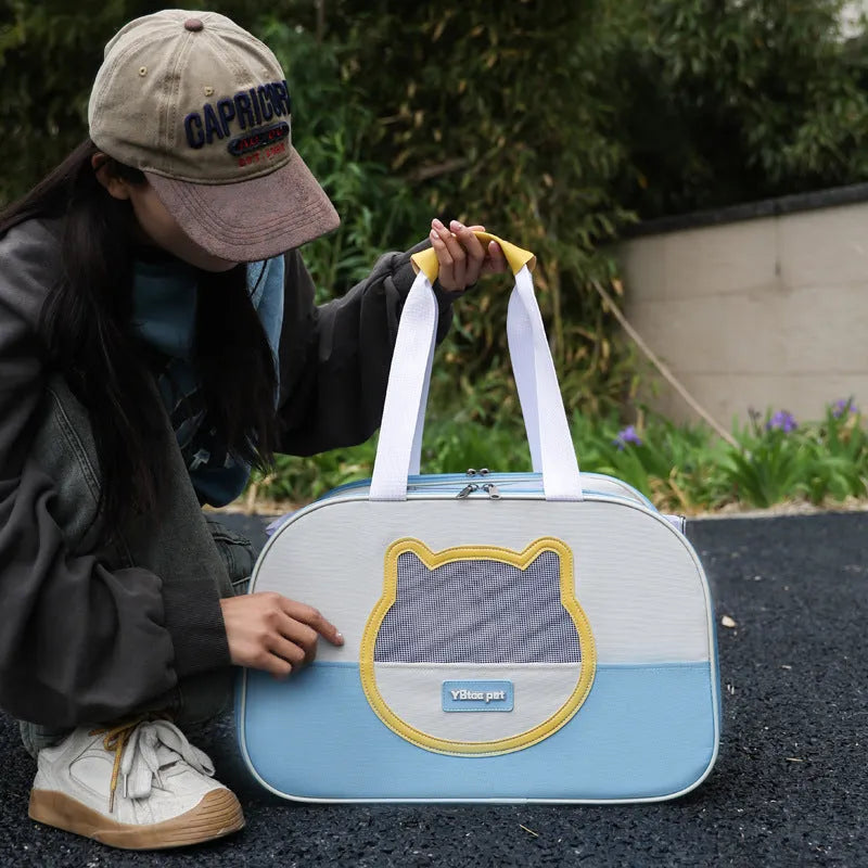 Blue foldable Oxford cloth cat carrier backpack showing large capacity and shoulder straps.
