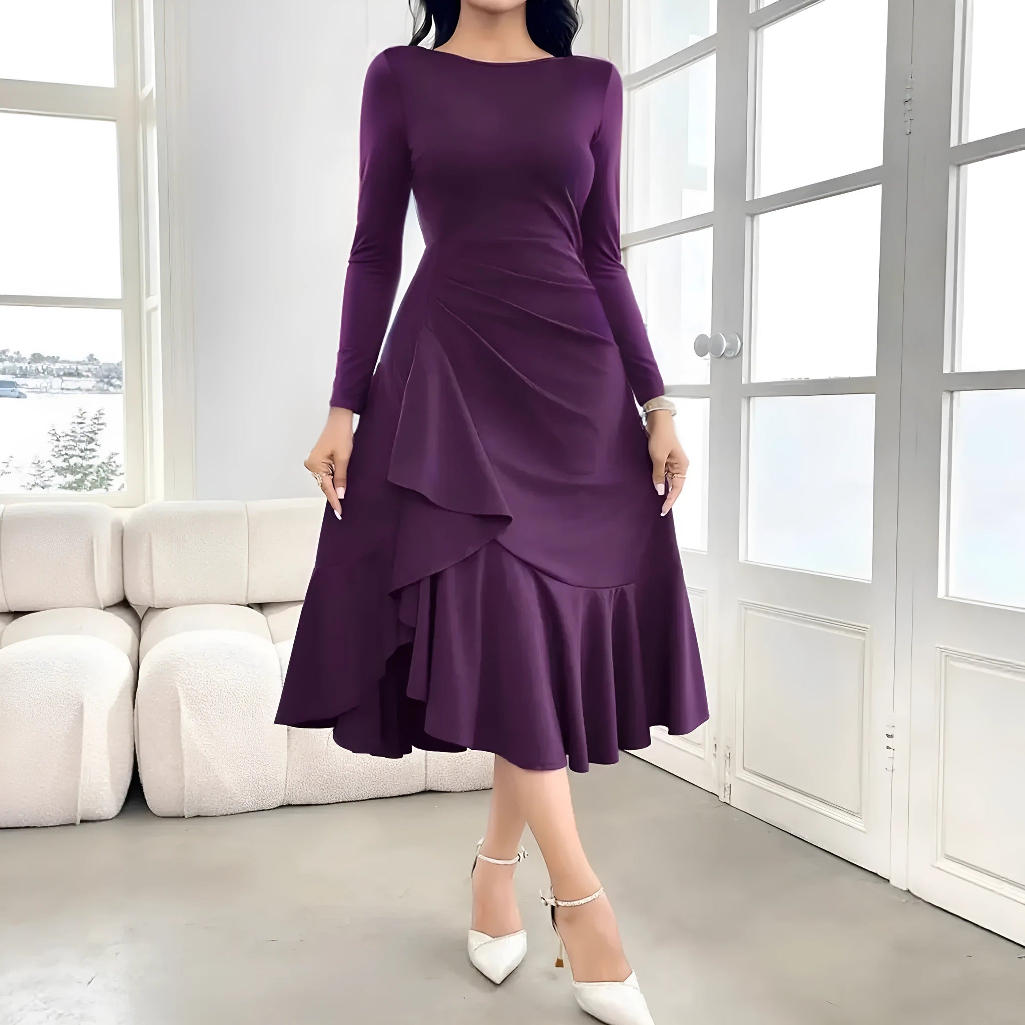 Purple women's long sleeve pullover dress with ruffles at the mid waist.