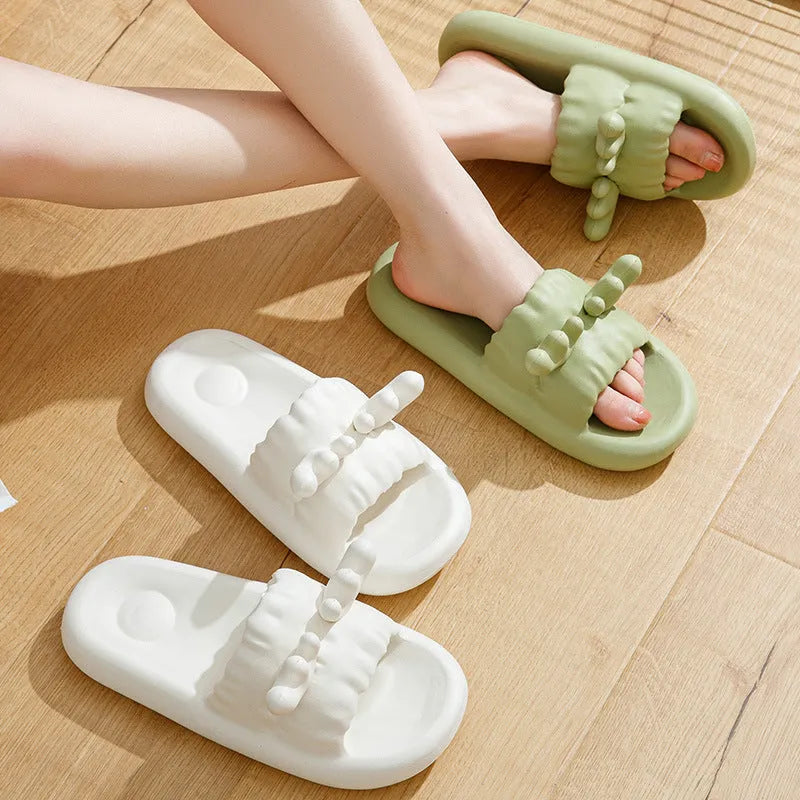 Women's deer horn pattern EVA flip-flop slippers in light yellow, showing hollow-out design and textured sole.