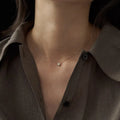 Oval geometric jelly opal pendant necklace in sterling silver with gold or white gold plating.