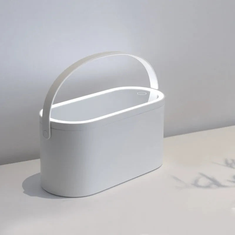 Portable LED mirror makeup organiser box with touch light, rotatable bracket, and soft handle in white
